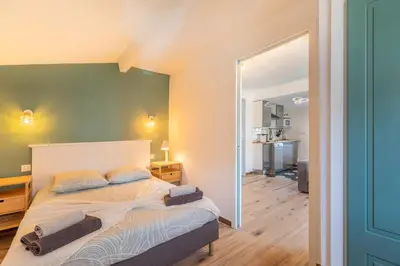 Un ou plusieurs lits dans un hébergement de l'établissement Villa Anaite Piscine privée