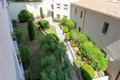 Jardin de l'établissement Eden Blue Wilson - Appt climatisé proche plage