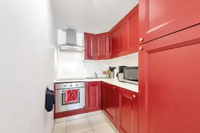 Cuisine ou kitchenette dans l'établissement Eden Blue Wilson - Appt climatisé proche plage