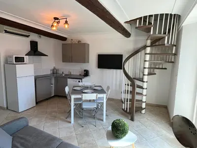 Cuisine ou kitchenette dans l'établissement Duplex vieille ville