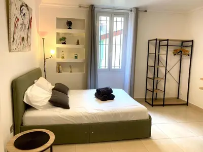 Un ou plusieurs lits dans un hébergement de l'établissement Grand Studio centre de Cannes