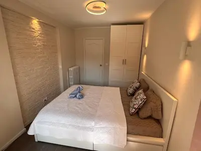 Un ou plusieurs lits dans un hébergement de l'établissement Les Arènes - Cannes centre, Charmant 2 pièces récemment rénové de 45 m2 avec sa terrasse de 10 m2