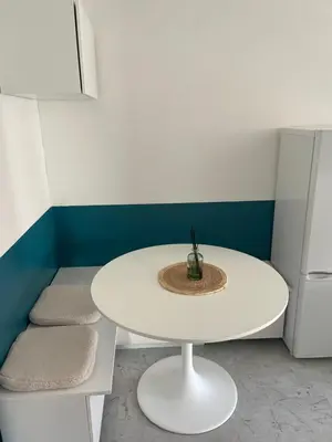 Coin salon dans l'établissement Petit deux pièces avec piscine
