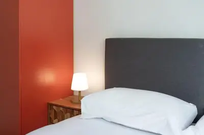 Un ou plusieurs lits dans un hébergement de l'établissement C9 -Staywiz us - 2 BDR 10 min Palais Festivals & Sea - AC, Parking & Balcony