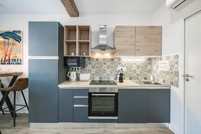 Cuisine ou kitchenette dans l'établissement Joli 2 pièces - Coeur de Ville - AW