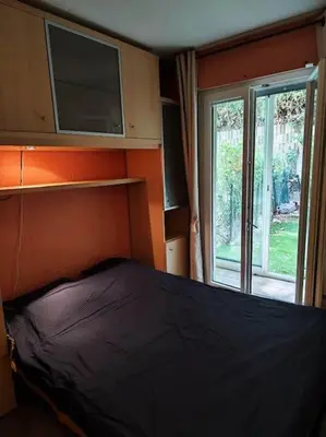 Un ou plusieurs lits dans un hébergement de l'établissement appartement rez de jardin 6 personnes cagnes sur mer 06 piscine et tennis