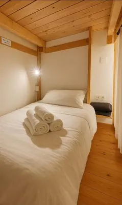 Un ou plusieurs lits dans un hébergement de l'établissement Paradis Côtier 6 couchages