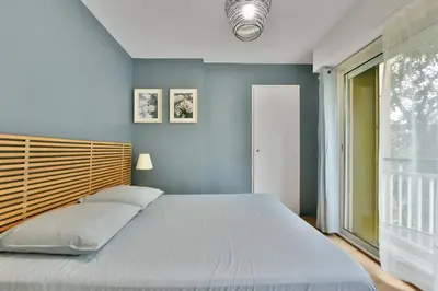 Un ou plusieurs lits dans un hébergement de l'établissement Le Sun Valley - Vidéoprojecteur et Terrasse Zen