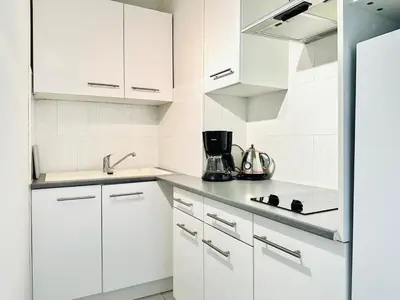 Cuisine ou kitchenette dans l'établissement Grand Hotel - Studio Croisette