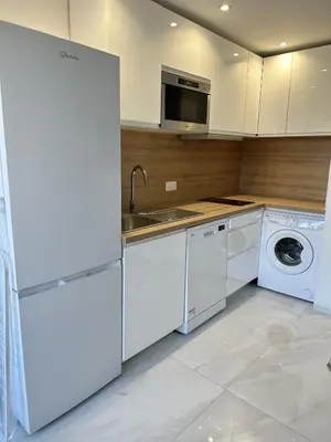 Cuisine ou kitchenette dans l'établissement Résidence Graziella appartement 410