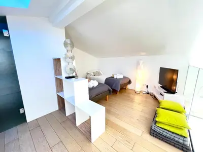 Coin salon dans l'établissement Capleouna-Villa la Cabane