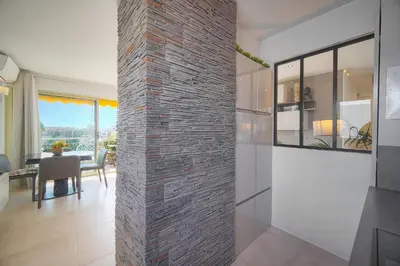 Cuisine ou kitchenette dans l'établissement FRGK 'Etoile du sud TERRASSE Vue Mer PALM BEACH WIFI FIBRE'