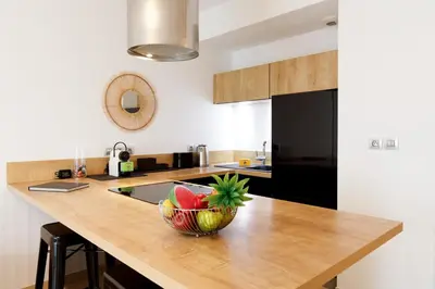 Cuisine ou kitchenette dans l'établissement Cannes Victoria YourHostHelper