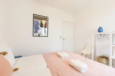 Un ou plusieurs lits dans un hébergement de l'établissement Cannes Victoria YourHostHelper