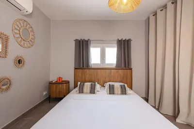 Un ou plusieurs lits dans un hébergement de l'établissement Maisonnette à 400m de la Plage