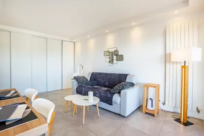Coin salon dans l'établissement One BDRM flat A/C-Congress/Beaches by Olidesi