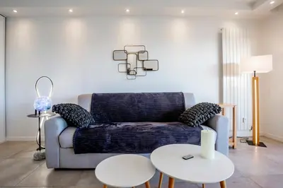 Coin salon dans l'établissement One BDRM flat A/C-Congress/Beaches by Olidesi