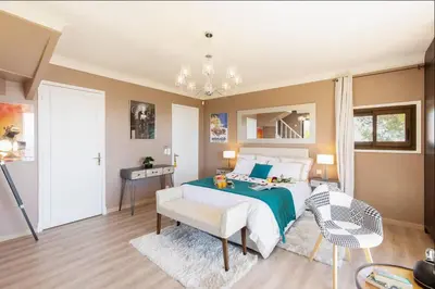Un ou plusieurs lits dans un hébergement de l'établissement LE CASTEL ROSE Super Cannes, face aux Îles de Lérins