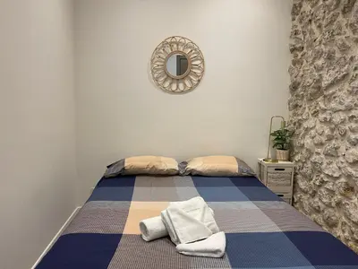 Un ou plusieurs lits dans un hébergement de l'établissement Charming Haven in Antibes