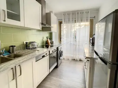 Cuisine ou kitchenette dans l'établissement Appartements centre ville Cannes
