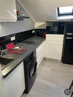 Cuisine ou kitchenette dans l'établissement Studio Cannes banane