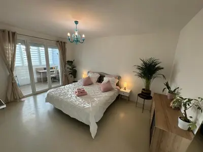Un ou plusieurs lits dans un hébergement de l'établissement Villa du Parc de Vaugrenier