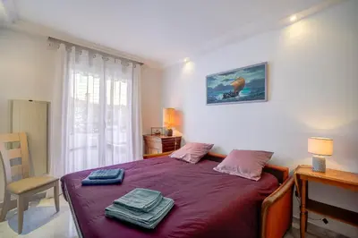 Un ou plusieurs lits dans un hébergement de l'établissement Le Cap St-Charles - Spacieux dernier étage - terrasses - climatisation - parking