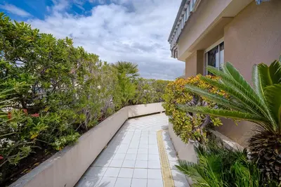 Jardin de l'établissement Le Cap St-Charles - Spacieux dernier étage - terrasses - climatisation - parking