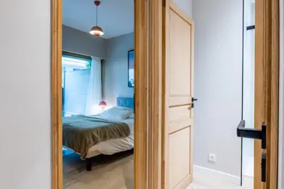 Un ou plusieurs lits dans un hébergement de l'établissement Downtown Cannes Apartment with Garden