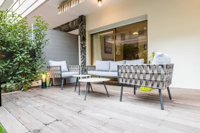 Coin salon dans l'établissement Downtown Cannes Apartment with Garden