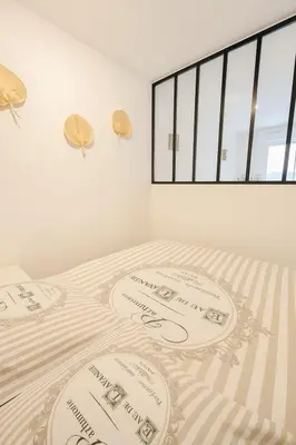 Un ou plusieurs lits dans un hébergement de l'établissement STUDIO 4 COUCHAGES - À 12 min de la plage à pied - Wifi inclus - parking et linge en option