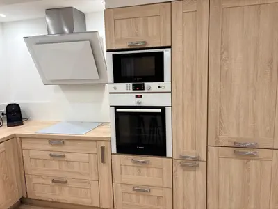 Cuisine ou kitchenette dans l'établissement Joli Rez de jardin 4 pièces à Cagnes sur Mer
