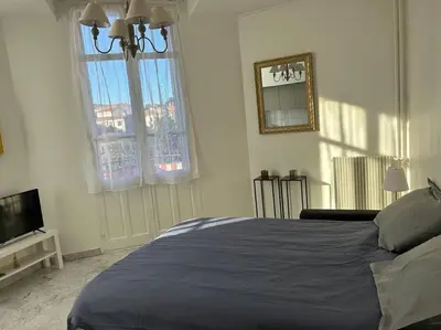 Un ou plusieurs lits dans un hébergement de l'établissement Studio 6minutes Croisette cannes