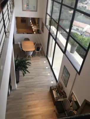 Coin salon dans l'établissement Villa Hélios - Vue Mer et Ville panoramique - Clim - Piscine - Luxe