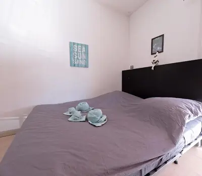 Un ou plusieurs lits dans un hébergement de l'établissement Studio Cagnes-Sur-Mer, Bord de mer, Côte d'Azur