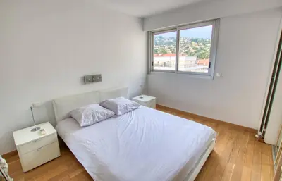 Un ou plusieurs lits dans un hébergement de l'établissement Le Clair Golfe-Juan - T2 terrasse vue mer Parking privé WIFI - LIMESTAY