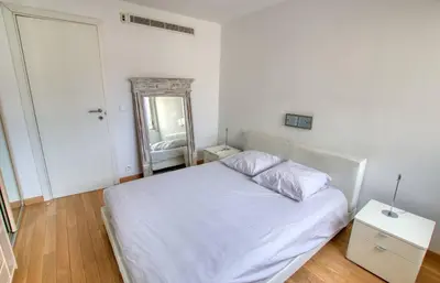 Un ou plusieurs lits dans un hébergement de l'établissement Le Clair Golfe-Juan - T2 terrasse vue mer Parking privé WIFI - LIMESTAY
