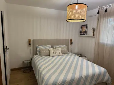 Un ou plusieurs lits dans un hébergement de l'établissement L'appart idéal famille, terrasse, piscine, plage