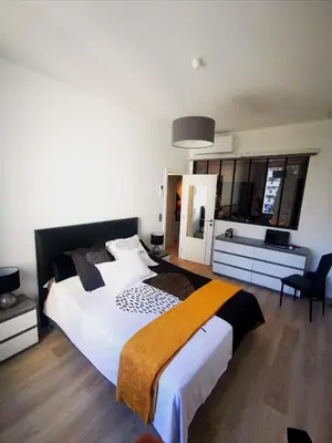 Un ou plusieurs lits dans un hébergement de l'établissement WE CANNES ! Résidence Gallia apartment premium two bedroom