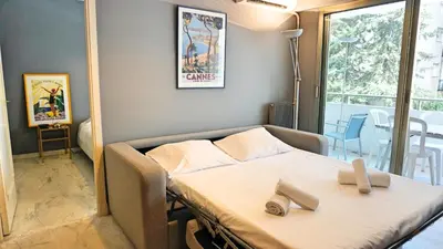 Un ou plusieurs lits dans un hébergement de l'établissement Proche Croisette, T2 avec terrasse, By Palmazur