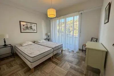 Un ou plusieurs lits dans un hébergement de l'établissement WE CANNES ! Amazing Sea View 2 Bedrooms La Vista