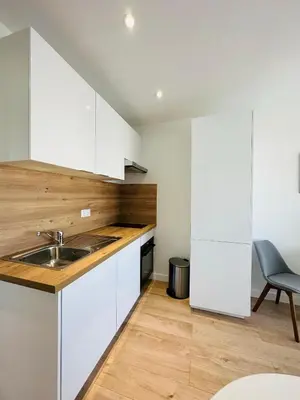 Cuisine ou kitchenette dans l'établissement LOTI