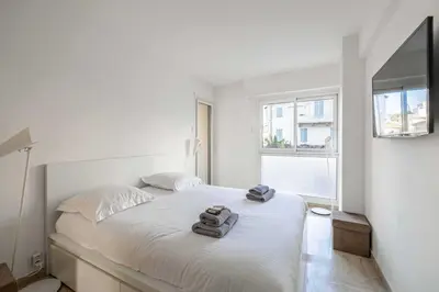 Un ou plusieurs lits dans un hébergement de l'établissement Charming apartment on Boulevard Alexandre III