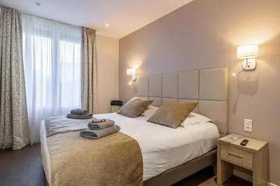Un ou plusieurs lits dans un hébergement de l'établissement Splendid apartment, Sea view, Parking - Croisette