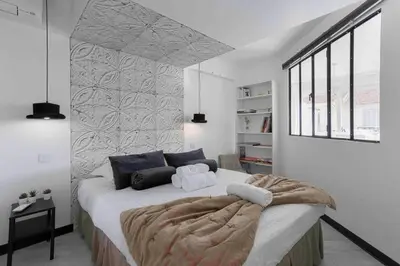Un ou plusieurs lits dans un hébergement de l'établissement Cannes Bliss - 12mn à pied du Palais, 5mn plages, clim, terrasse