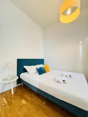 Un ou plusieurs lits dans un hébergement de l'établissement Studio chaleureux proche croisette Mimont29