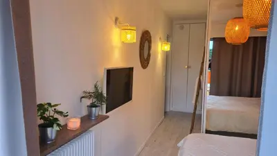 Télévision ou salle de divertissement dans l'établissement Charmant T2 de vacances, Antibes