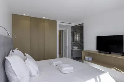 Un ou plusieurs lits dans un hébergement de l'établissement Luxury Penthouse Montfleury by Halldis