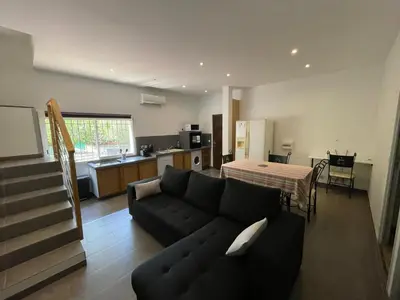 Coin salon dans l'établissement Holiday Home l'Angelet