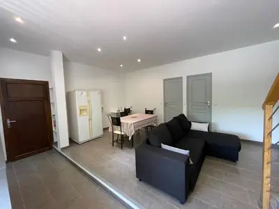 Coin salon dans l'établissement Holiday Home l'Angelet
